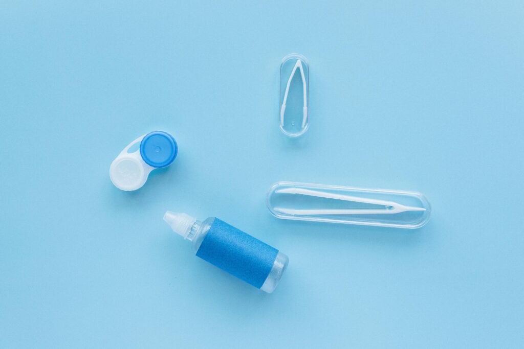 Contact Lenses Set on Blue Background